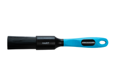 Detailpinsel aus einem Pinselset der KOM Duschen GmbH – Fahrrad-Detailing mit steifen schwarzen Borsten und einem strukturierten blauen Griff.