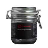 Ein Klarglasbehälter mit der Aufschrift OPTIMIZE DEGREASING CONTAINER mit einem Metallverschluss und einem schwarzen Etikett, perfekt für die Aufbewahrung von Kettenwachs. Das leere Glas hat einen versiegelten Deckel und ist mit einer Anleitung und einem Branding versehen, um die Verwendung zu erleichtern.